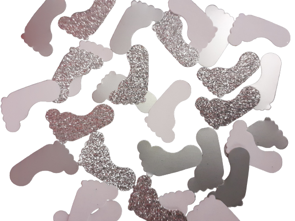 Små söta konfettifötter i silver, silverglittrigt och vitt. Babyshower. Dop.